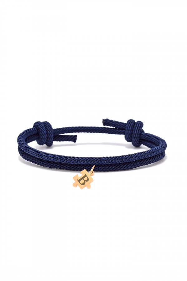 Pulsera-cuerda-azul-puzzle-dorado