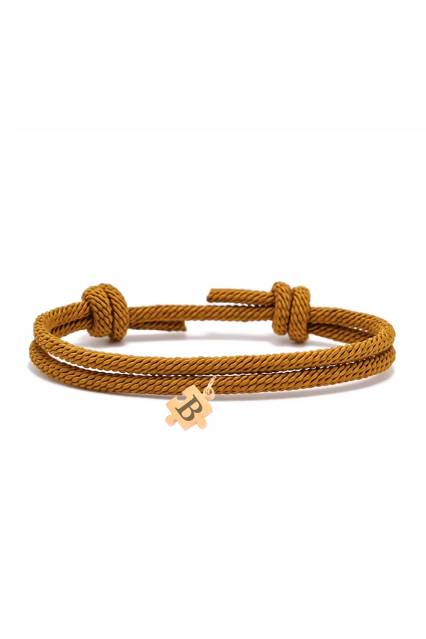 Pulsera cuerda camel puzzle dorado