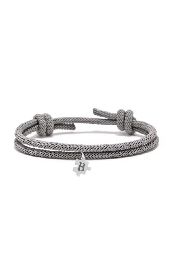 Pulsera-cuerda-rosa-puzzle-dorado